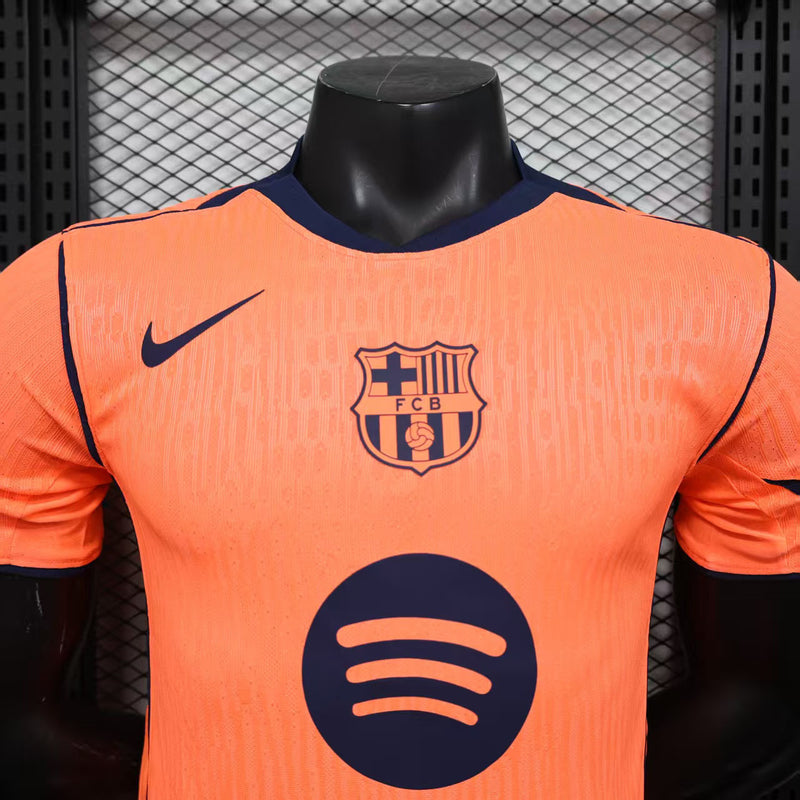 CAMISOLA VERSÃO PLAYER DO BARCELONA 25/26 LARANJA E PRETO